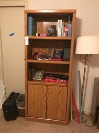 #21 Oak look bookcase w/2 doors 30x12x71 $75
