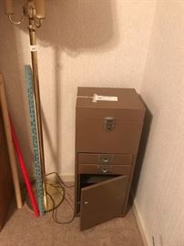 #22 Metal cabinet w/file on top and drawers on bottom 12x10x30 $45