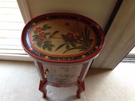 oval painted cupboard with door