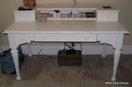 White Desk measuring 56 inches wide, 32 inches deep and 36 inches high