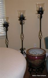 Three metal candelholders