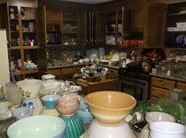 Kitchen filled to the max w/mixing bowls