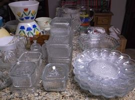 Refrigerator dishes and Fire King nesting splash proof bowls w/tulips   
