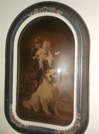Convex framed portrait of children and dog