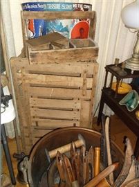 Wooden chicken coop, huge 24" copper pot full of wooden spools, shuttles, mule hames, and smaller copper pot 16"