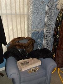 1920's chair, wrought iron screen, and ostrich feathers