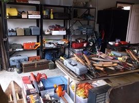 Storage shelves and tools galore