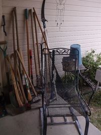 Gardening tools and one of a pair of spring base outdoor chairs