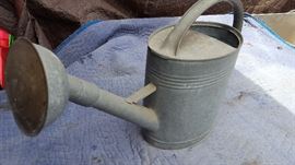 antique watering can