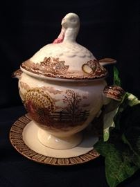 One of two Kingtom hand-decorated gravy bowl