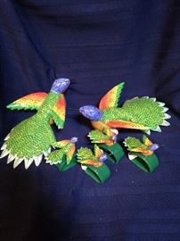 Brilliantly colored birds and 4 of the 11 matching napkin rings