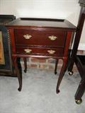 Two drawer mahogany thin leg table