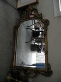 Gold Italianate style large mirror.