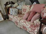 Red and white twoile rooster sofa, brand new upholstery.