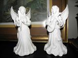 Pair of white ceramic angels.  Detailed.
