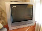 Toshiba flat screen TV with DVD and VHS player.