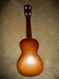 BACK OF CHILDREN'S GUITAR