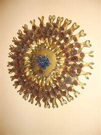 Absolutely fabulous gold wreath made with plastic 6-pack rings
