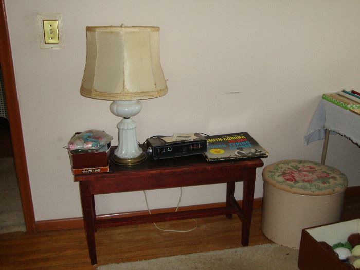 Piano bench, milk glass table lamp