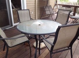 Outdoor table and five chairs....$135.  Presale  available.  