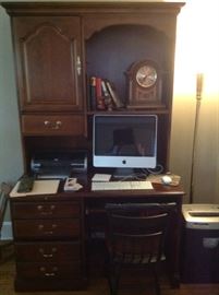 Desk with shelving and Apple computer...computer has been "cleaned"