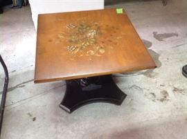 Small square topped table...black base.  $35