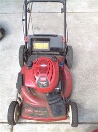Toro lawnmower with leaf bag and gas can.  Self propelled... $100.... Works great
