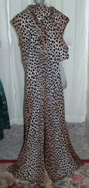 WOW!! SO VINTAGE AND FUNKY!! JUMP SUIT WITH WIDE BELL BOTTOMS. THE ARMS CONVERT INTO BUILT IN LONG SLEEVES!! SO CUTE!!