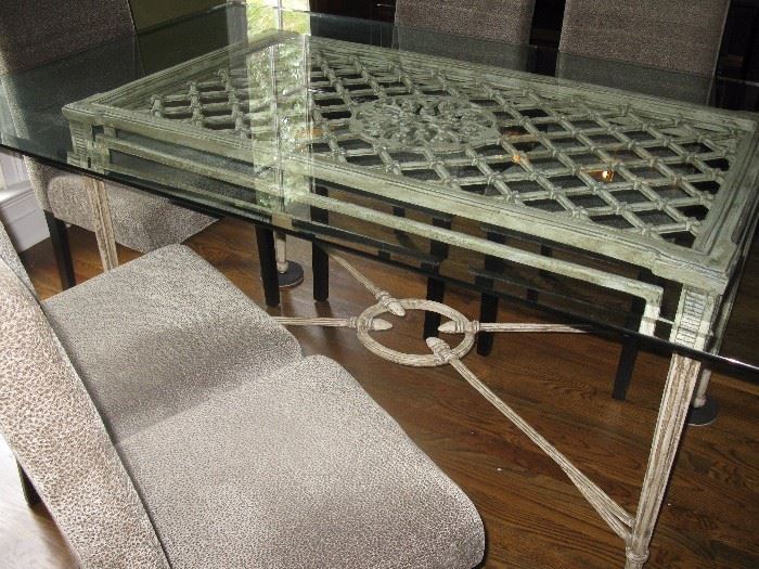Dining table - wrought iron base - beveled glass top - measures about 72" x 42"