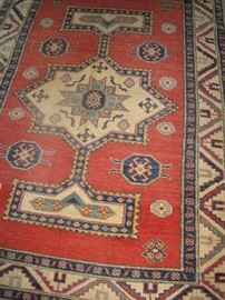 area rug - measures about 5' x 5'