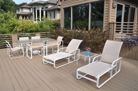 White metal outdoor dining table with 6 chairs, 2 lounge chairs and side table available!