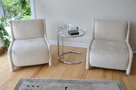 Ivory upholstered low lounge chairs 28"h x 27"w x 29"d