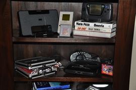 In motion digital speaker system, vintage Game Boy DMG-01 and vintage Sega Game Gear 2110