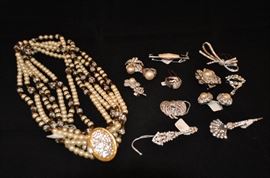 In addition to the amazing clothing collection, there are HUNDREDS of pieces of fabulous jewelry including vintage rhinestone!