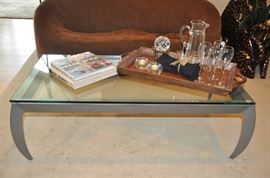 Contemporary steel and heavy glass coffee table