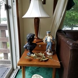Danish modern walnut table, figurines, and carved wood lamp carved by Gus Luders (Chet's father).