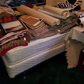 Double bed, comforters, paper items, local history items, etc.