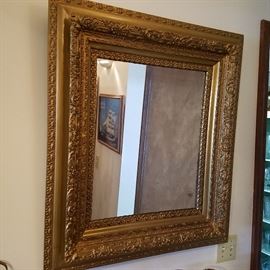 Gilt frame mirror.