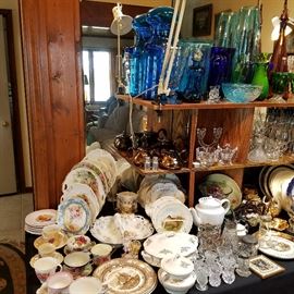 10' of table space full of china and glass