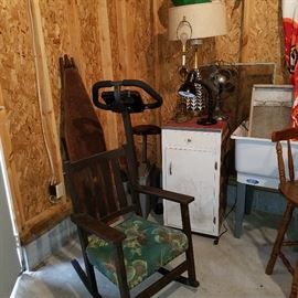 Garage....mission rocker, wood ironing board, exercise bike, and some vintage items