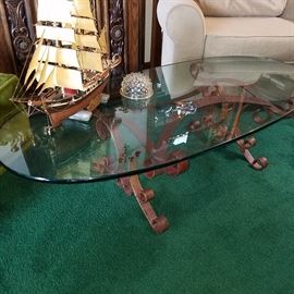 Coffee table with iron base.  