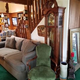 Sofa, green upholstered arm chair, Howard Miller clock (needs some TLC...runs and stops)