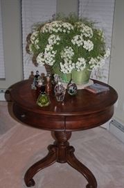 Round Wood Foyer Table (Pedestal) with Perfume Bottles and Floral Decorative