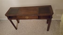 console with drawer and 2 glass features on top