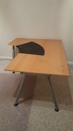 ikea curved table with removable black keyboard cover