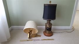 wall lamp - gold w/ white shade
side table lamp - nautical looking with black shade