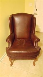 leather wingback chair - amber/brown color