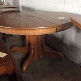 This is a one of a kind large oak table.  Look at the Pedestal.