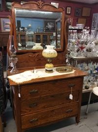Another marvelous oak dresser with beautiful applied carving mirror.