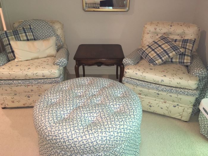 two upholstered chairs, ottoman